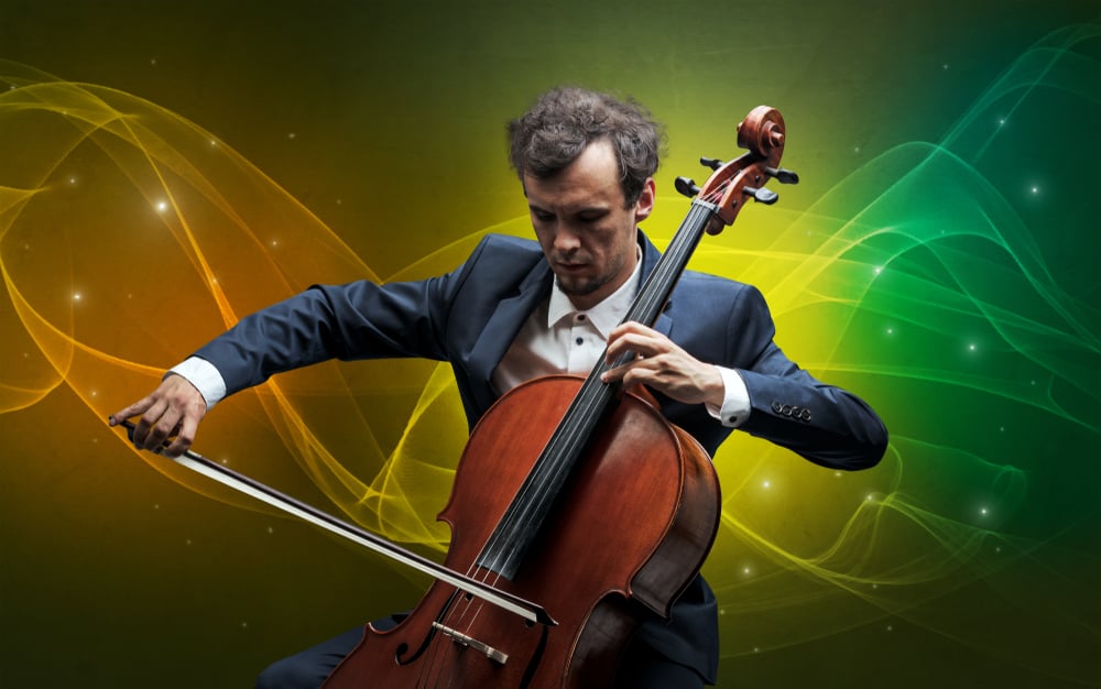 Serious classical cellist with fabled sparkling wallpaper